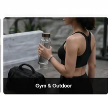 Glass water bottle used outdoors for neoprene sleeve protection article